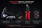 Premium installation kit for LED headlights with tools and guide on a black background